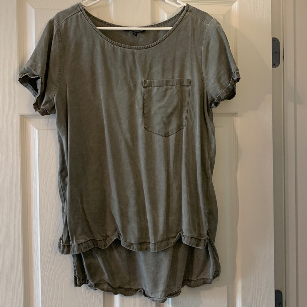 Loved this shirt! Similar to a denim feel. Good fit on top and loose on bottom.